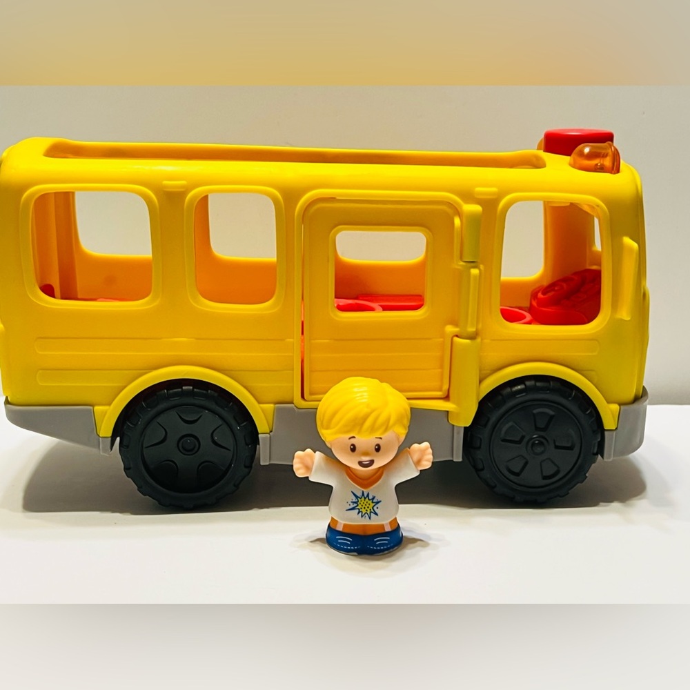 Fisher-Price Little People Smiling Yellow and Red Toy Bus with one Figure
